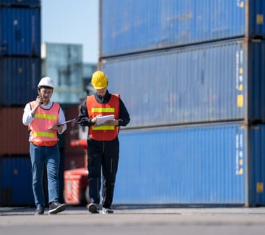 Two freight worker walking together